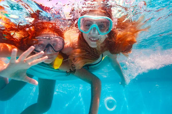 Two Happy Girls Scuba Mask Swim Underwater Wave Hand Camera — Stock Photo, Image