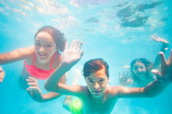 Group Three Friends Young Kids Dive Underwater Together Waving Hands — Stock Photo, Image