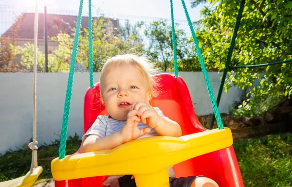 Photograph Beautiful Little Boy Swings Backyard — Stock Photo, Image