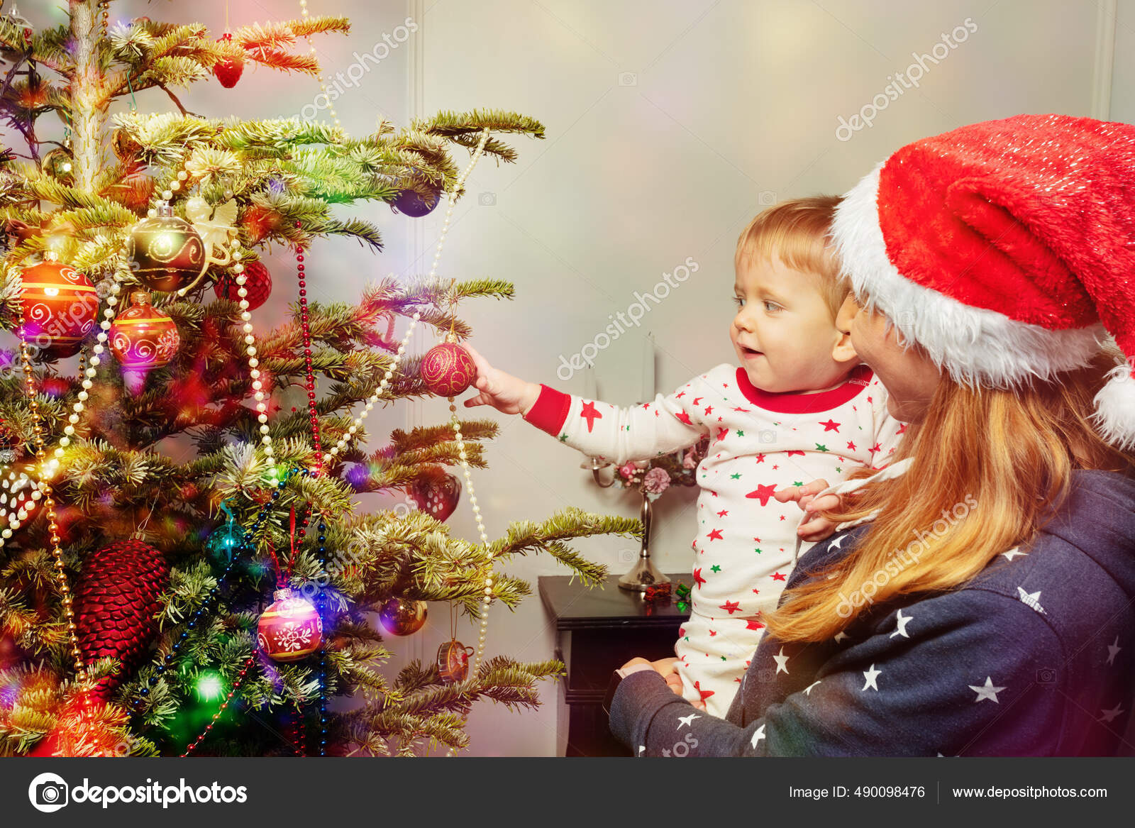Mother Little Boy Put Ball Christmas Tree Engaged Look Wearing Stock