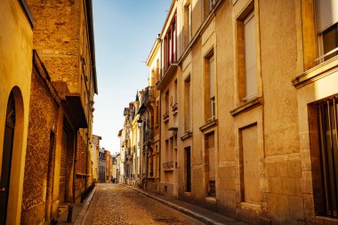 Reims downtown small street with old buildings in historical center