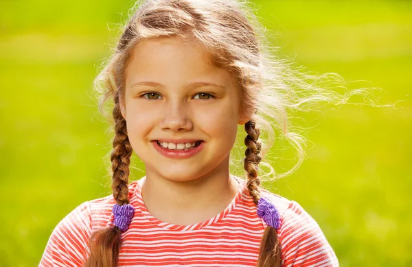 Cute girl with two braids — Stock Photo, Image