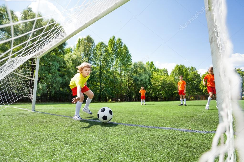 Boy tries to catch ball