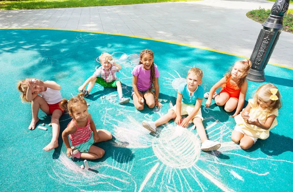 Kids draw with chalk — Stock Image Kids draw with chalk Royalty Free Stock Images