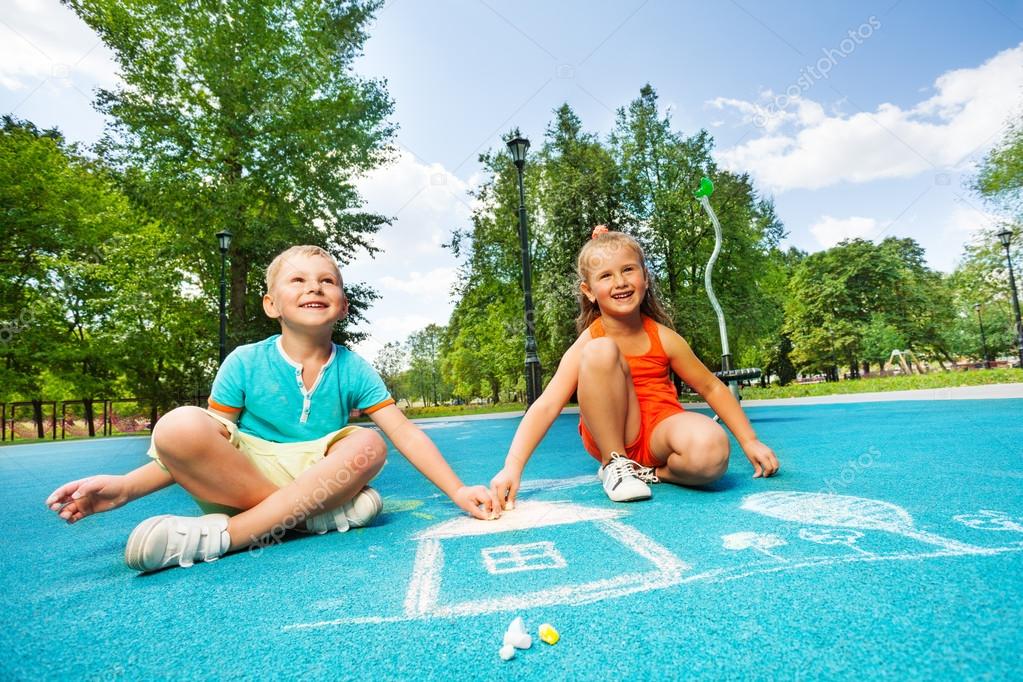 Boy Girl And Chalked Drawing Stock Photo By C Serrnovik