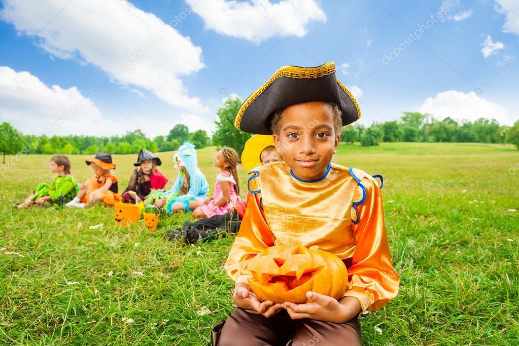 Smiling African boy in pirate costume