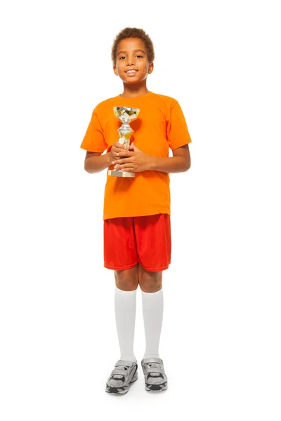 Boy holding winners cup prize — Stock Photo, Image