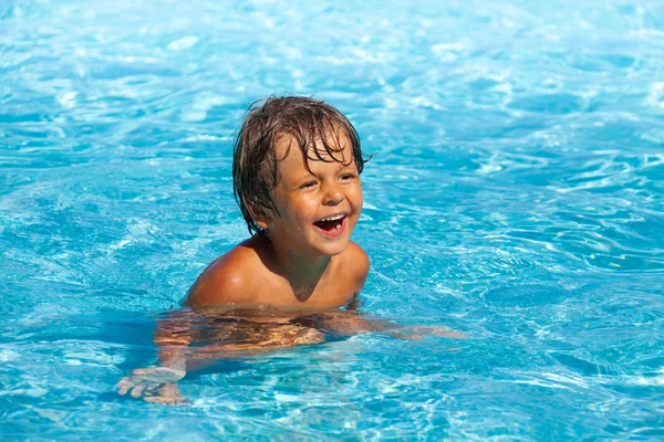 Laughing in swimming pool — Stock Photo, Image