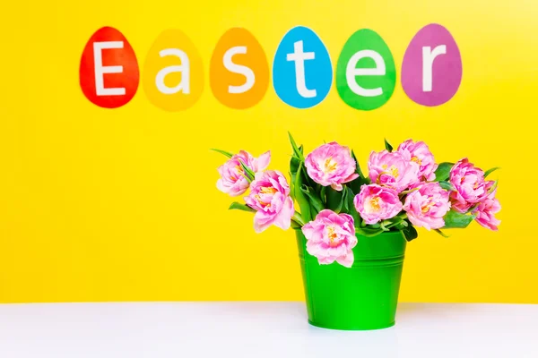 Pink flowers and word Easter — Stock Photo, Image