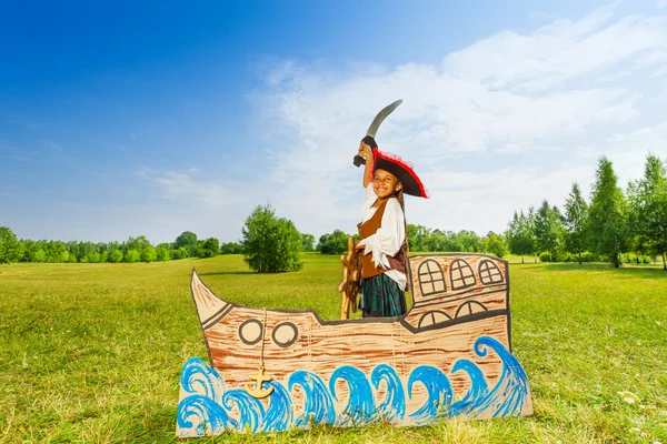 Girl in pirate costume with sword — Stock Photo, Image