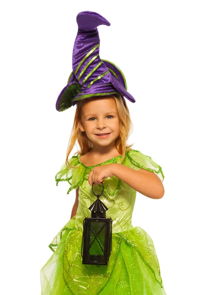 Girl in Halloween costume with lantern — Stock Photo, Image