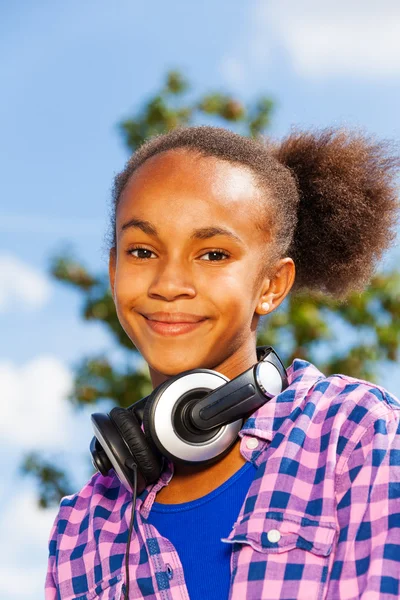 African girl with headphones — Stock Photo, Image