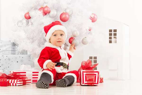 Little boy with presents — Stock Photo, Image