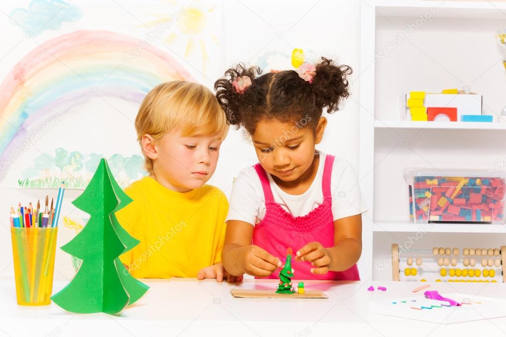 Boy and girl making forms