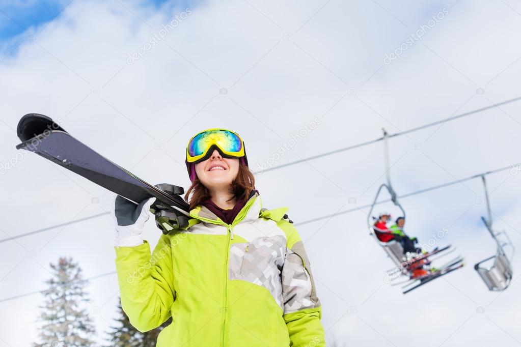 Woman in mask with ski lift