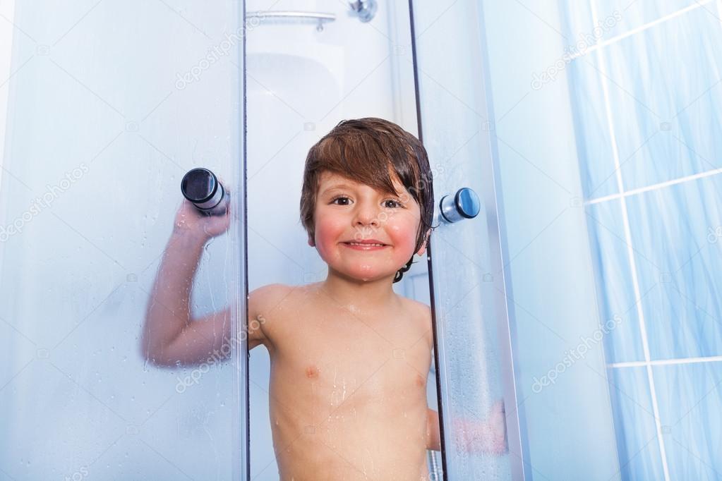 Boy in shower cabin