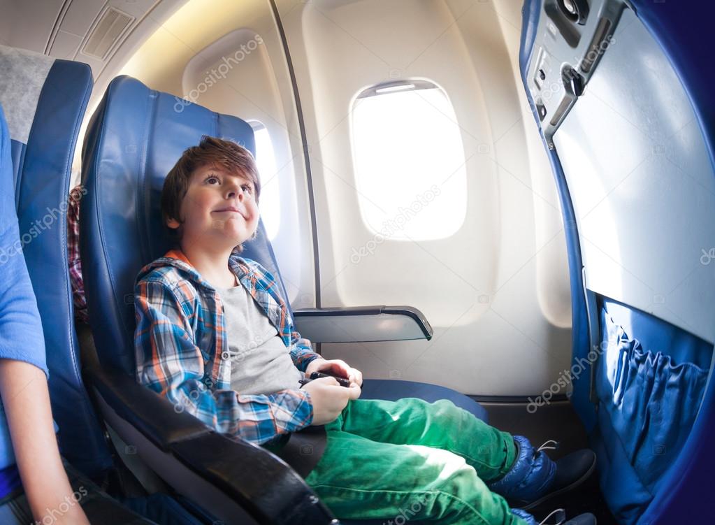 Little boy in airplane seat