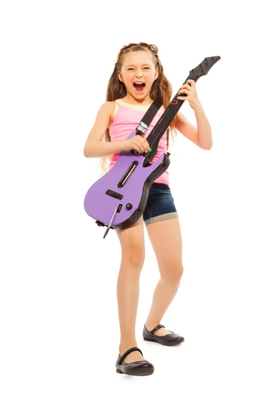 Excited girl playing guitar — Stock Photo, Image
