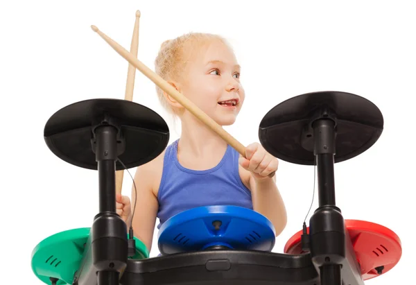 Niña pequeña jugando en platillos — Foto de Stock