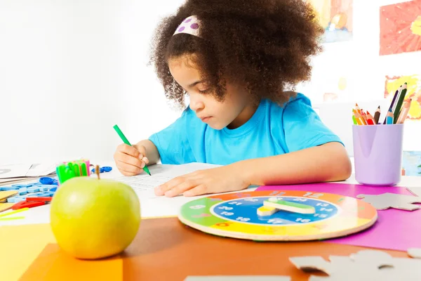 Small girl writing letters — Stock Photo, Image