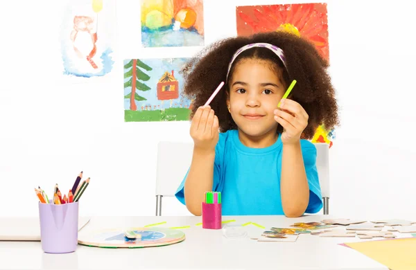 African girl holds cuisenaire rods — Stock Photo, Image
