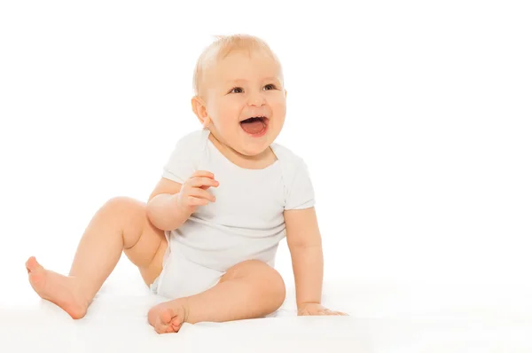 Feliz riendo bebé en traje de cuerpo blanco — Foto de Stock