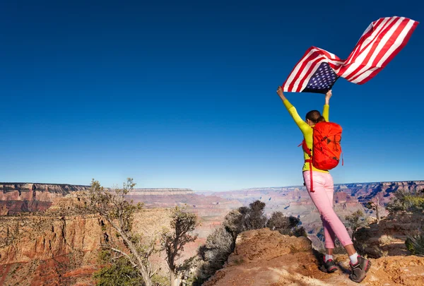 Woman and US flag — Stock fotografie