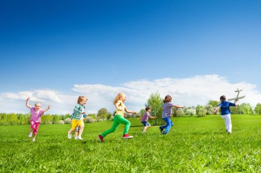 happy running kids with airplane toy