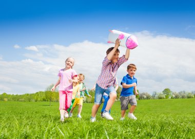 boy holding rocket carton toy