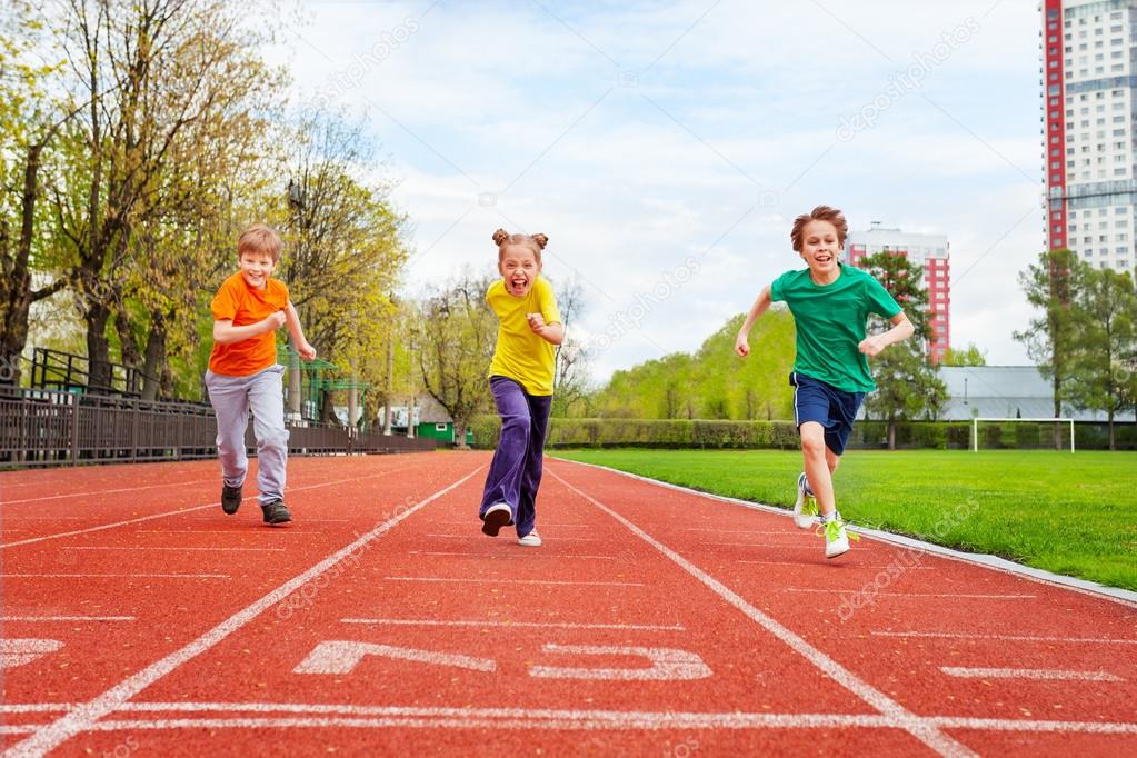 Children running marathon on finish line