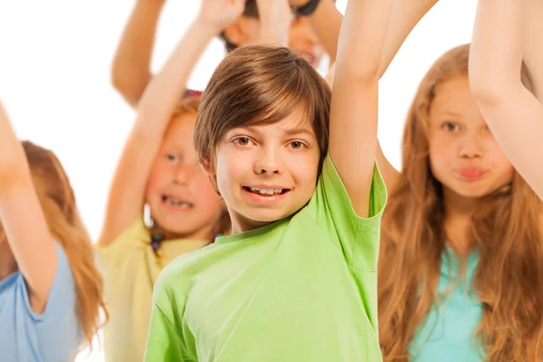 Kids cheering in the crowd — Stock Photo, Image