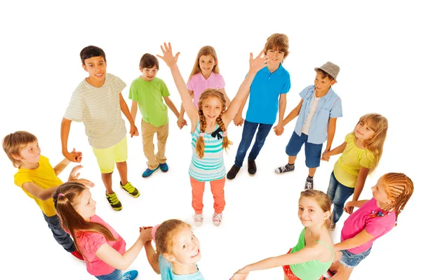 Happy girls standing in kids circle — Stock Photo, Image