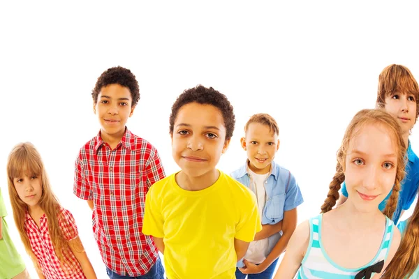 Kids stand together boys and girls look up — Stock Photo, Image