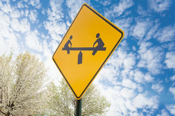 Teeter-totter gele teken — Stockfoto