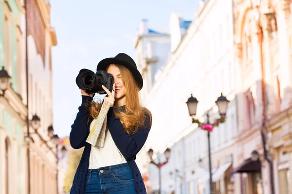 Woman shooting with camera — Stock Photo, Image