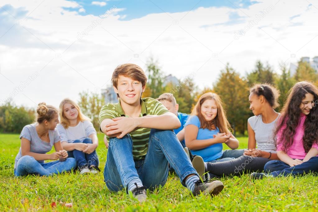 Boy and his friends  in park