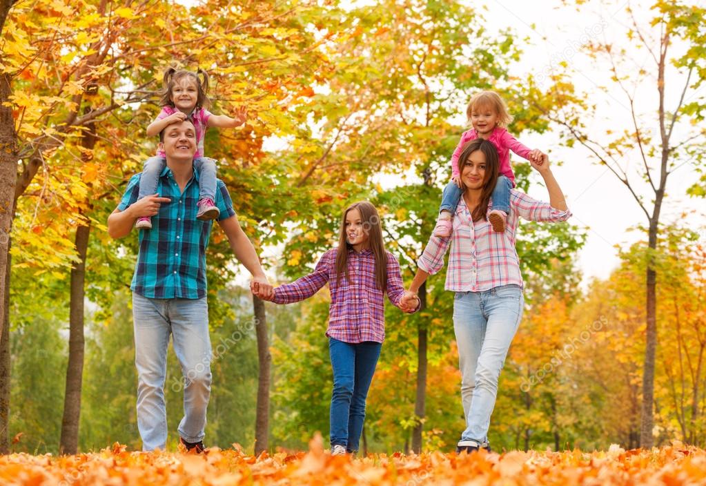 family  in autumn park