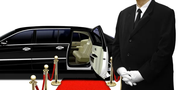 Limousine chauffeur standing by the car — Stock Photo, Image