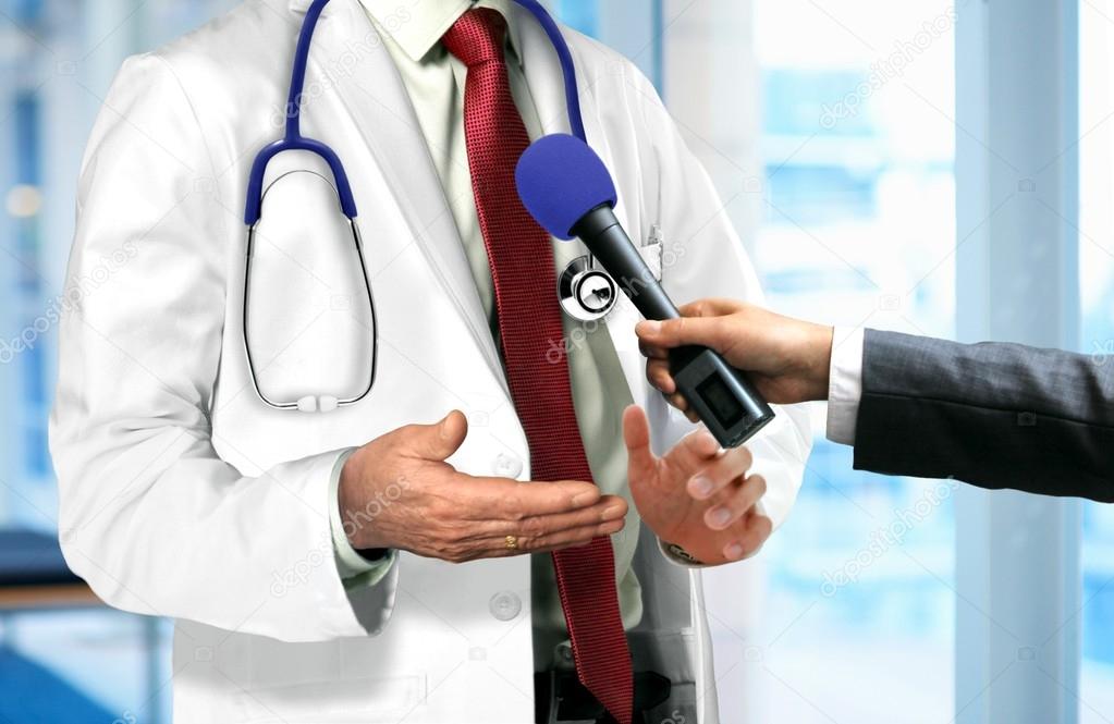 Doctor Talking to Microphone