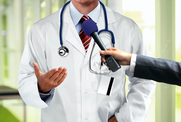 Doctor press interview — Stock Photo, Image