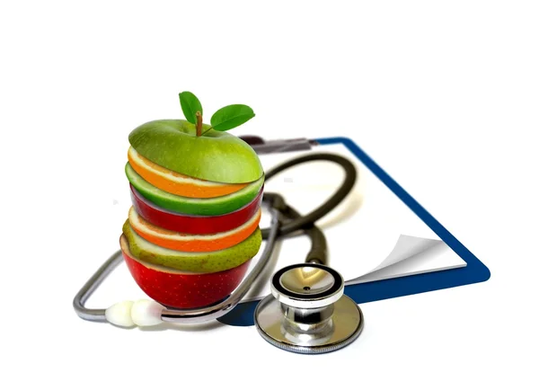 Slice fruits and stethoscope — Stock Photo, Image