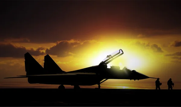 Fighter jet under sunset on super carrier at sea — Stock Photo, Image