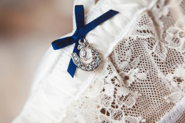 A white linen garter — Stock Photo, Image