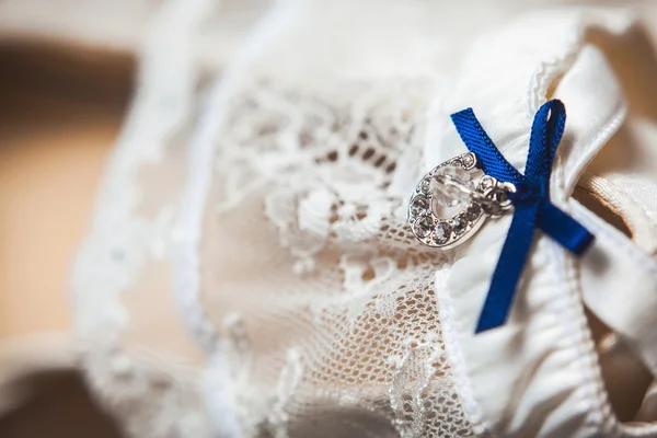 A white linen garter — Stock Photo, Image