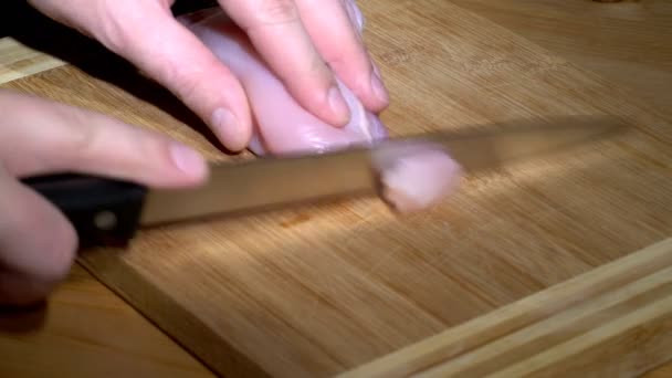 Cutting a piece of turkey breast — Stock Video