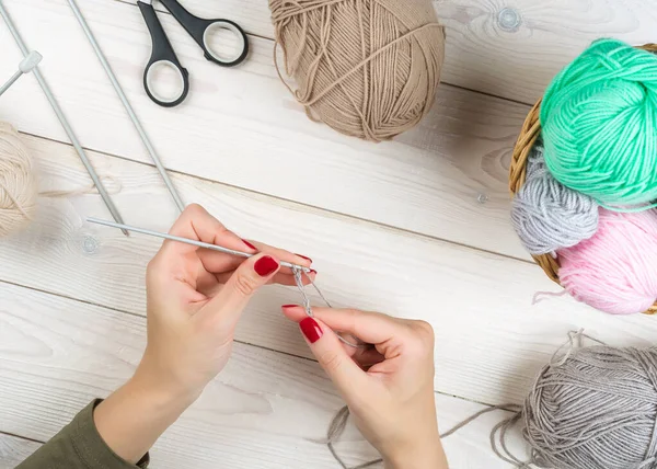 Knitting. Hand Crochet. Female hand knit hook. Top view. Knitting in woman hands — Stock Photo, Image