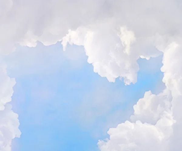 Abstract background with white clouds in blue sky — Stock Photo, Image