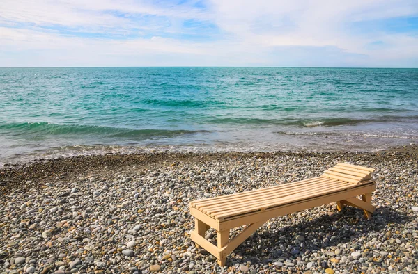 Beach plank bed at sea edge — Stock Photo, Image