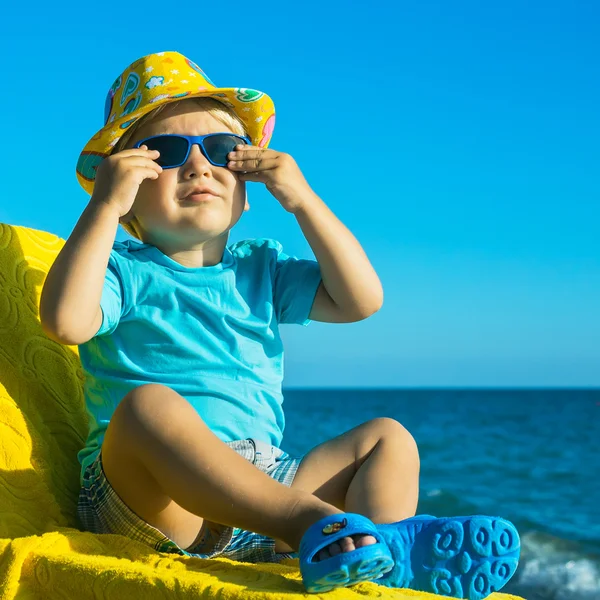 Emotional baby resting in tropical sea — Stock Photo, Image