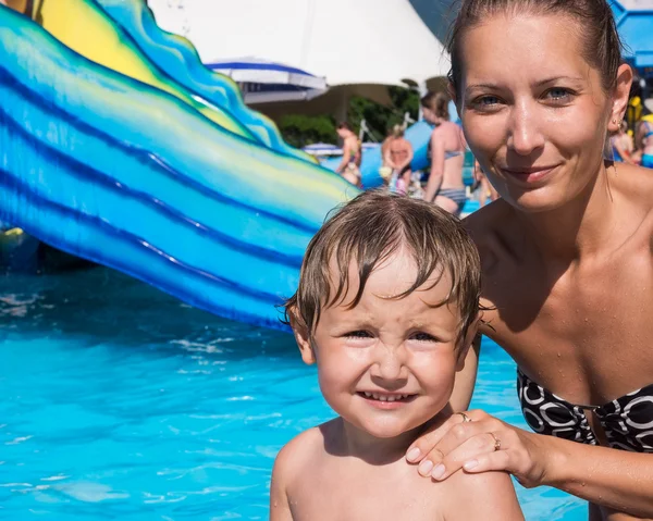 Family vacation with a child in the water park — Stock Photo, Image